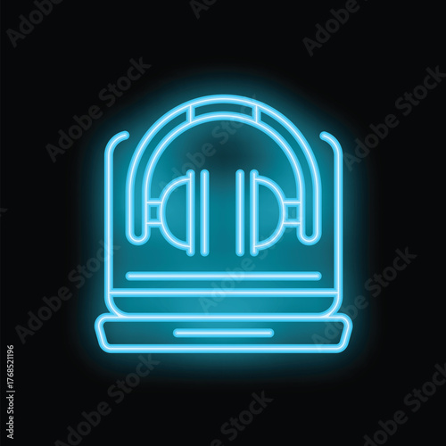 Glowing blue neon icon of headphones lying on laptop symbolizing music streaming service