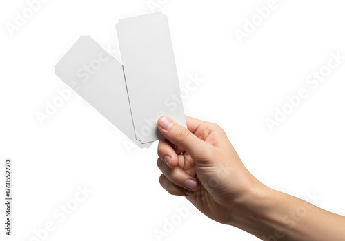 Hand holding two blank white tickets or stubs isolated on transparent background