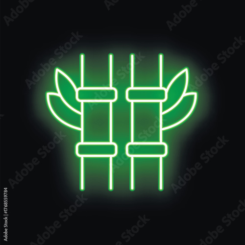 Glowing green neon sign depicting bamboo stems and leaves on a black background