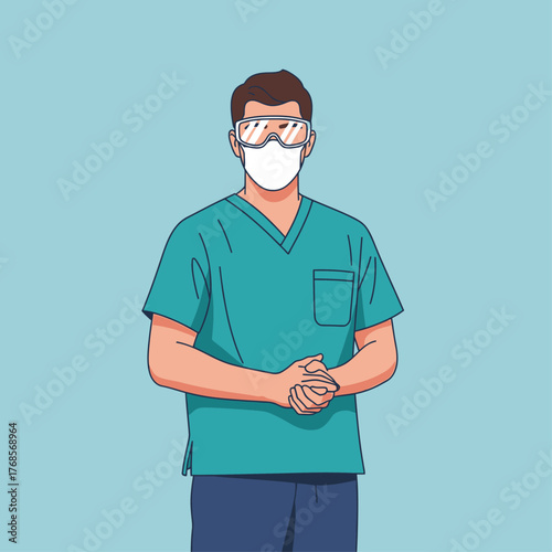 Male doctor in green scrubs wearing a face mask and protective goggles.