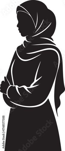 Silhouette of a muslim woman wearing a hijab and abaya standing profile view