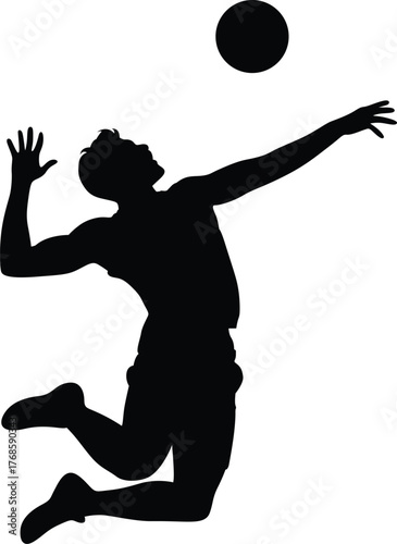 Silhouette of a male volleyball player jumping to spike the ball during a competitive game
