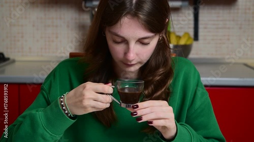 Woman enjoying her morning coffee at home