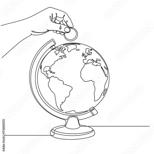 Hand placing coin on globe symbolizing financial dreams and aspirations  