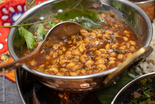 Indian lentils, dal, in a traditional  copper bowl