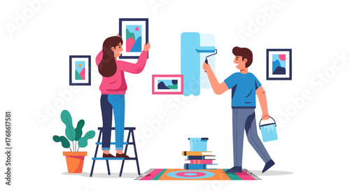 Couple Decorating Their New House, Painting Wall And Hanging Pictures Together