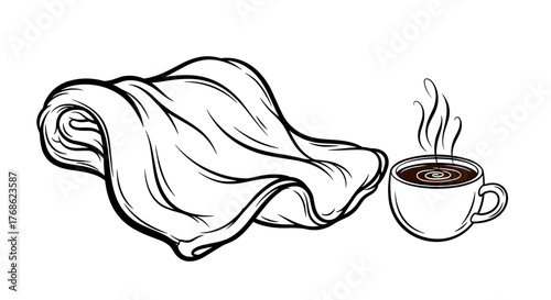 Fleece blanket and hot chocolate in cozy winter atmosphere  