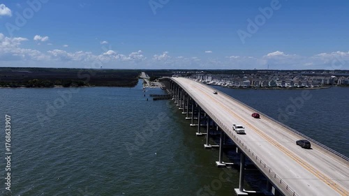Wallpaper Mural Aerial View Of Washington Baum Bridge Over Calm Water of Roanoke Sound Connecting Roanoke Island to Nags Head on the Outer Banks. Bright blue sky, tranquil water, urban-seaside scene. Torontodigital.ca