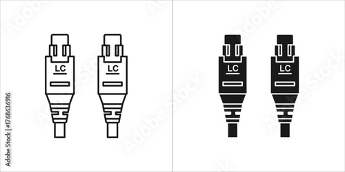 Two lc fiber optic connectors, one outlined and one solid black