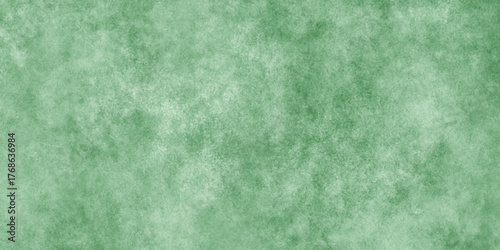 Abstract Elegant dark green background with mottled vintage texture in old fancy background design, texture of colored parchment paper.	
