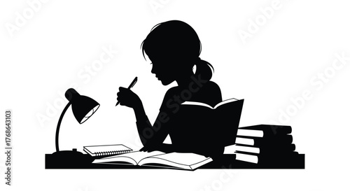 Silhouette of a woman studying with a book and desk lamp