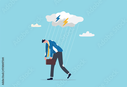 Having bad day, disappointed work, discourage or depression, failure feeling bad or difficulty, having problem and trouble concept, depressed wet businessman walking in raining thunderstorm.