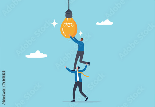 Partnership to success together, teamwork help get solution to solve problem, support to togetherness, collaboration and cooperation concept, businessman help support coworker to turn on lightbulb.