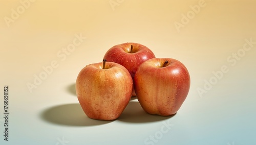 Three Spheres of Crimson Hue, Drops of Water, Smooth Texture, Light Yellow and Pale Blue.