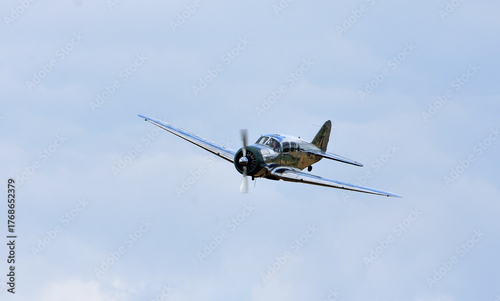 Fototapeta premium Vintage Spartan 7W Executive aeroplane in flight