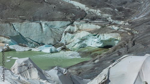 Time lapse, ice in a glacier lake. Melting glacier in the Swiss Alps. Rhone Glacier, the source of the river Rhone. Furka Pass, Canton Valais, Switzerland