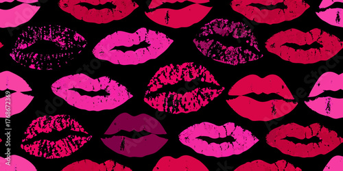 A vibrant seamless pattern of lipstick kiss marks in various shades of pink and red against a black background