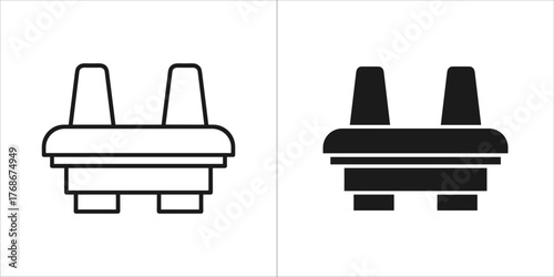 Two electrical plug adapters, one in outline and one in solid black