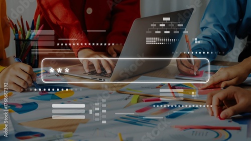 Foto A vibrant office scene showcasing multiple hands engaged in creative tasks at a collaborative workspace featuring laptops, colorful documents, and art supplies