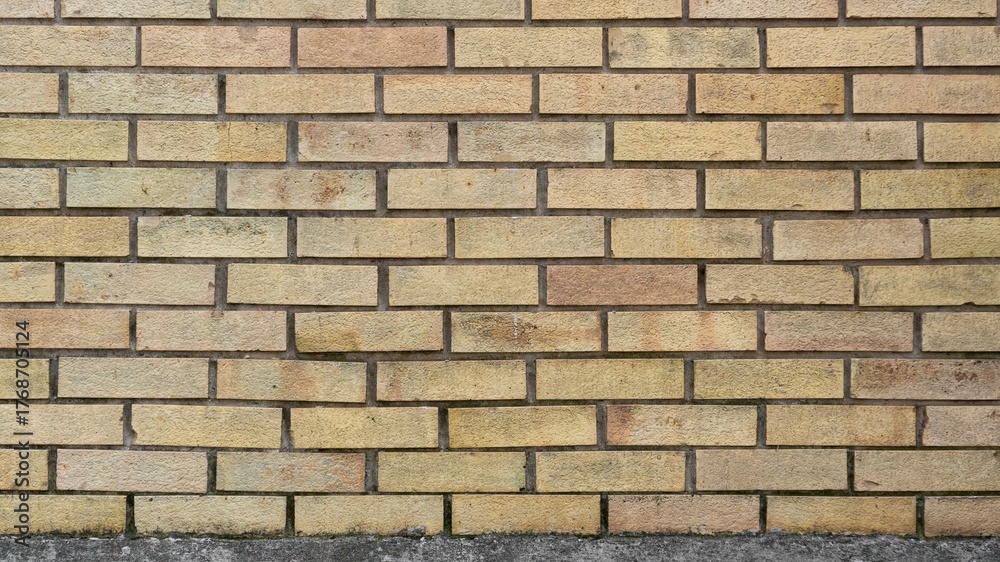 Fototapeta premium Beige brick wall background