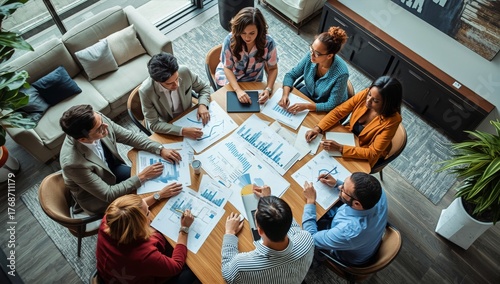 Group of Professionals Discussing Data and Strategies During a Business Meeti...