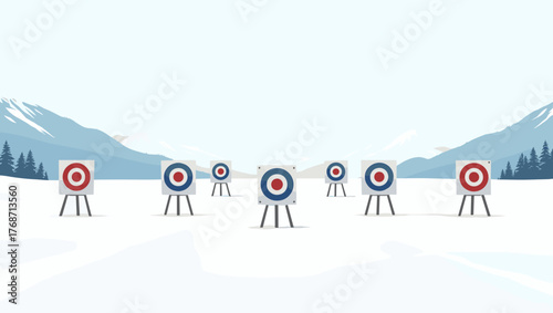 Empty biathlon shooting range with multiple targets in snowy landscape