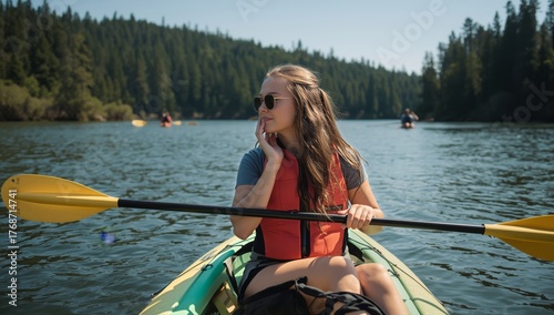 Kayaking Adventure on a Serene Lake Surrounded by Lush Forests