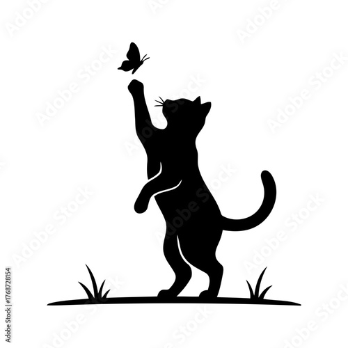 Vector art of silhouette of a cat standing on its hind legs trying to catch a butterfly