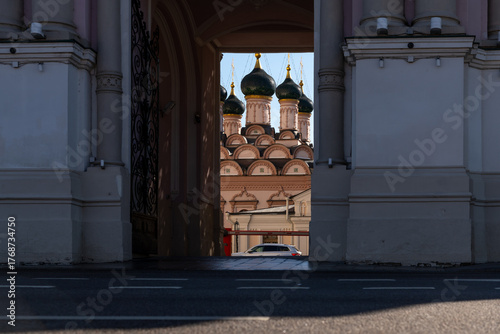 Beautiful view of domes in Moscow, Russia through an archway