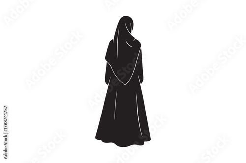 Silhouette of a woman wearing a traditional islamic dress