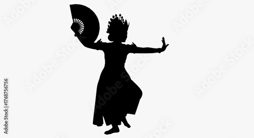 Captivating silhouette of traditional Balinese dancer gracefully performing a cultural dance
