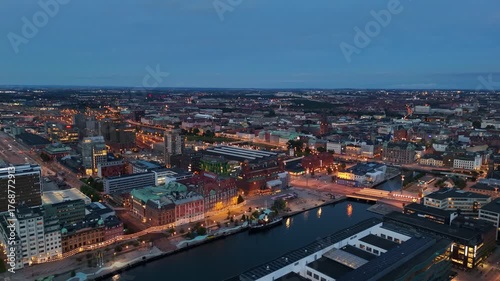 Wallpaper Mural Soft shadows fall across Västra Hamnen’s boardwalk and buildings Torontodigital.ca