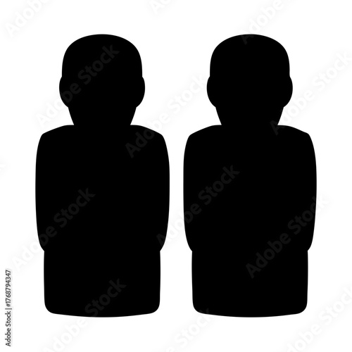 Silhouette of Two Abstract Figures Standing Side By Side In the Darkness