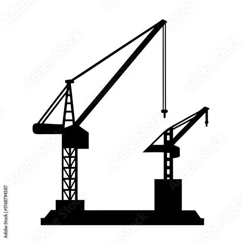 Silhouette of construction cranes conveying a sense of industry and development projects
