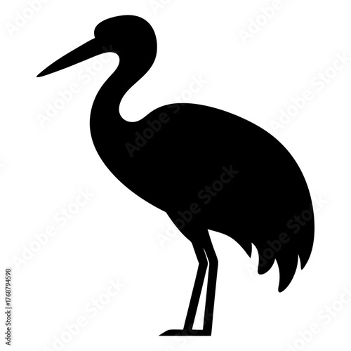 Silhouette of a stately heron, standing gracefully with its long neck curved
