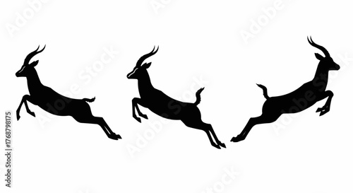 Three antelopes leaping gracefully in silhouette against a stark white background showing movement and freedom