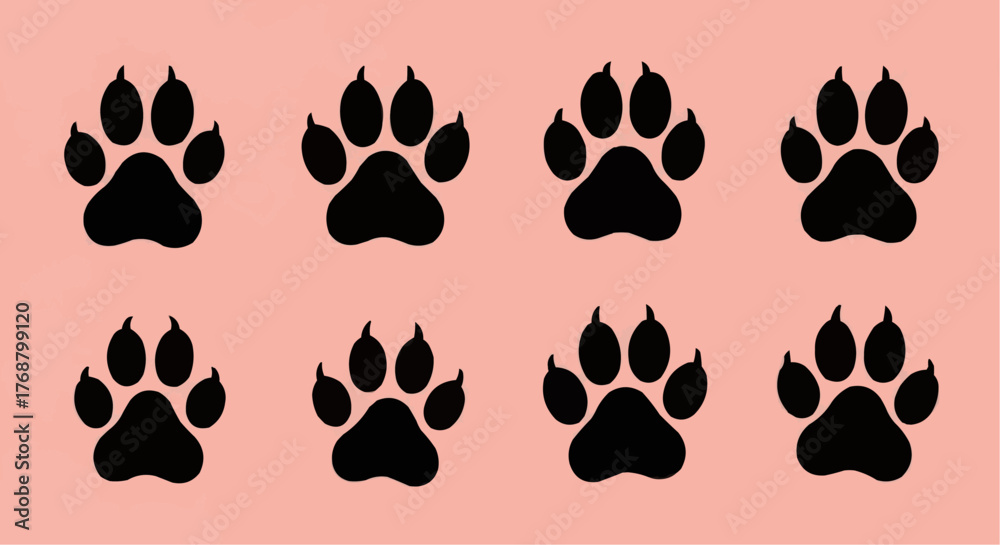 Fototapeta premium Eight black paw prints arranged in two rows on a light pink background create a simple pattern