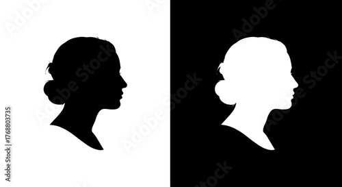 A classic black and white graphic showing two opposite silhouettes of a woman's elegant profile with an updo hairstyle.