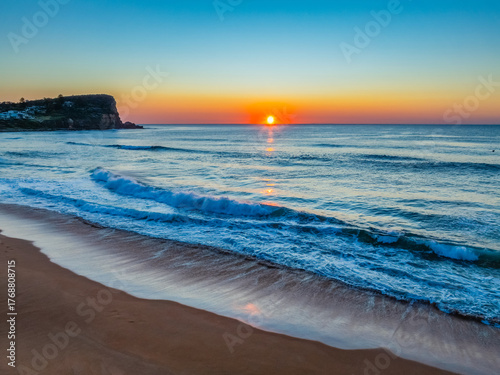 Blush Horizon: Sunrise by the Sea