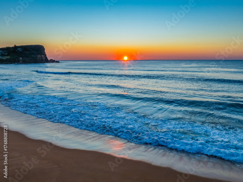 Blush Horizon: Sunrise by the Sea