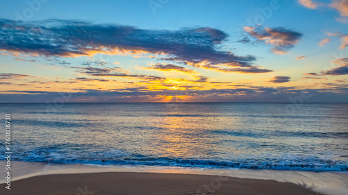 Sunrise Seascape Over Gentle Ocean Swells