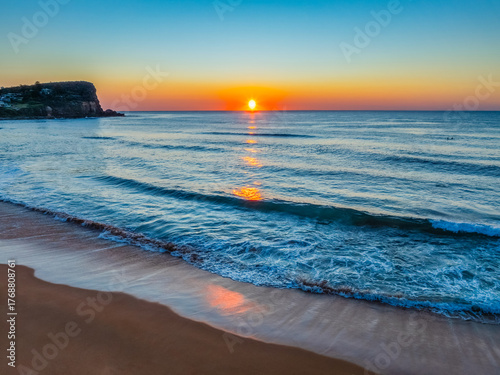 Blush Horizon: Sunrise by the Sea