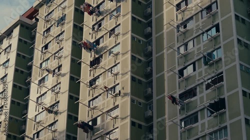 Singapore Apartment Block Architecture – Urban brutalist structure with hanging laundry.