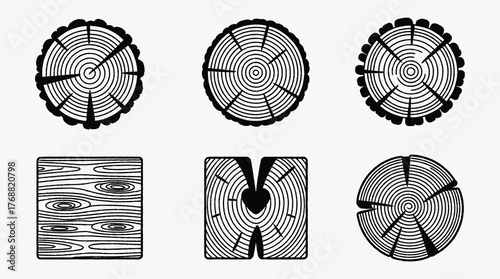 Black and white tree trunk sections showcasing wood grain patterns