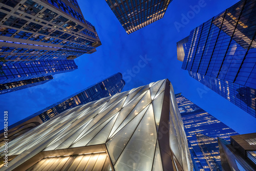 Schilderij op canvas Low-angle shot of Manhattan’s Hudson Yards buildings at night highlighting tower