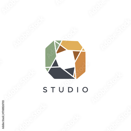 A geometric, abstract logo with a colorful shape in the upper center and the word "STUDIO" below