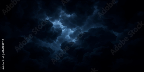 An abstract blue cloudscape featuring blue smoke and light in a dark atmosphere