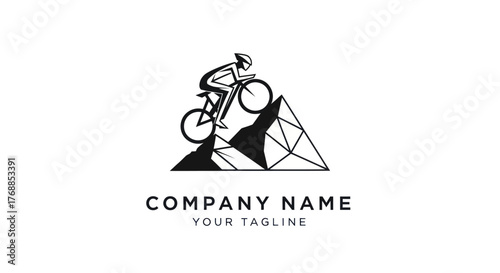 Cyclist Conquering Mountain Peak - A Symbol of Endurance and Adventure.