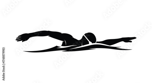 Dynamic silhouette of a swimmer performing the freestyle stroke in choppy water with powerful arm movements silhouette