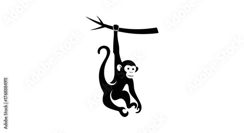 A cute monkey hangs from a branch, showcasing its playful nature and arboreal skills.